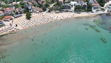 Kandıra'da yaz sezonu öncesi hareketlilik: Turkuaz renkli sulara akın ettiler