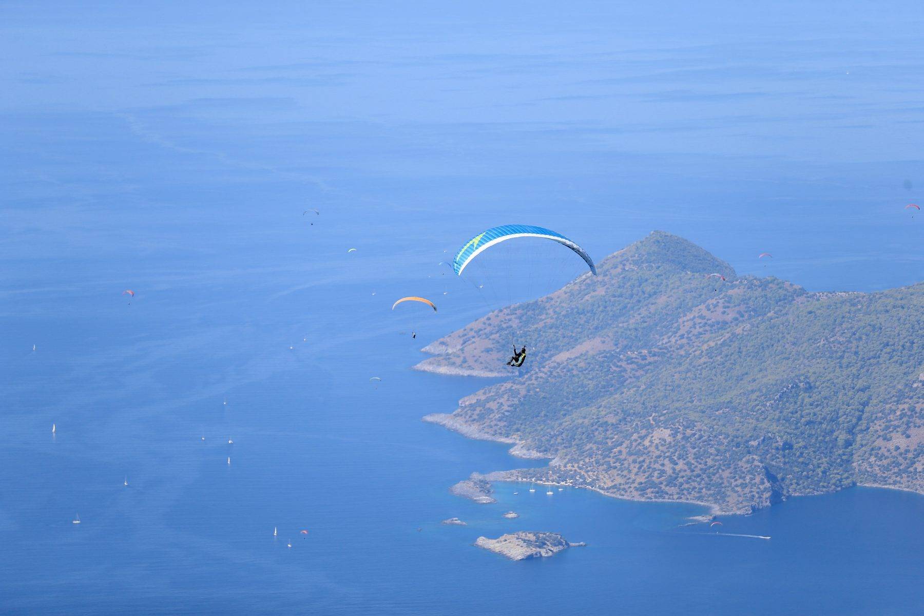 Çinli turistler Fethiye'ye akın etti: "Yamaç paraşütü yapan 3 kişiden biri Çinli"